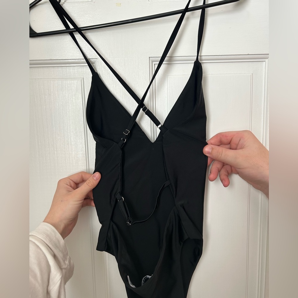 Tiger Mist Black Strappy back bodysuit.